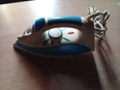 Electric pressing iron