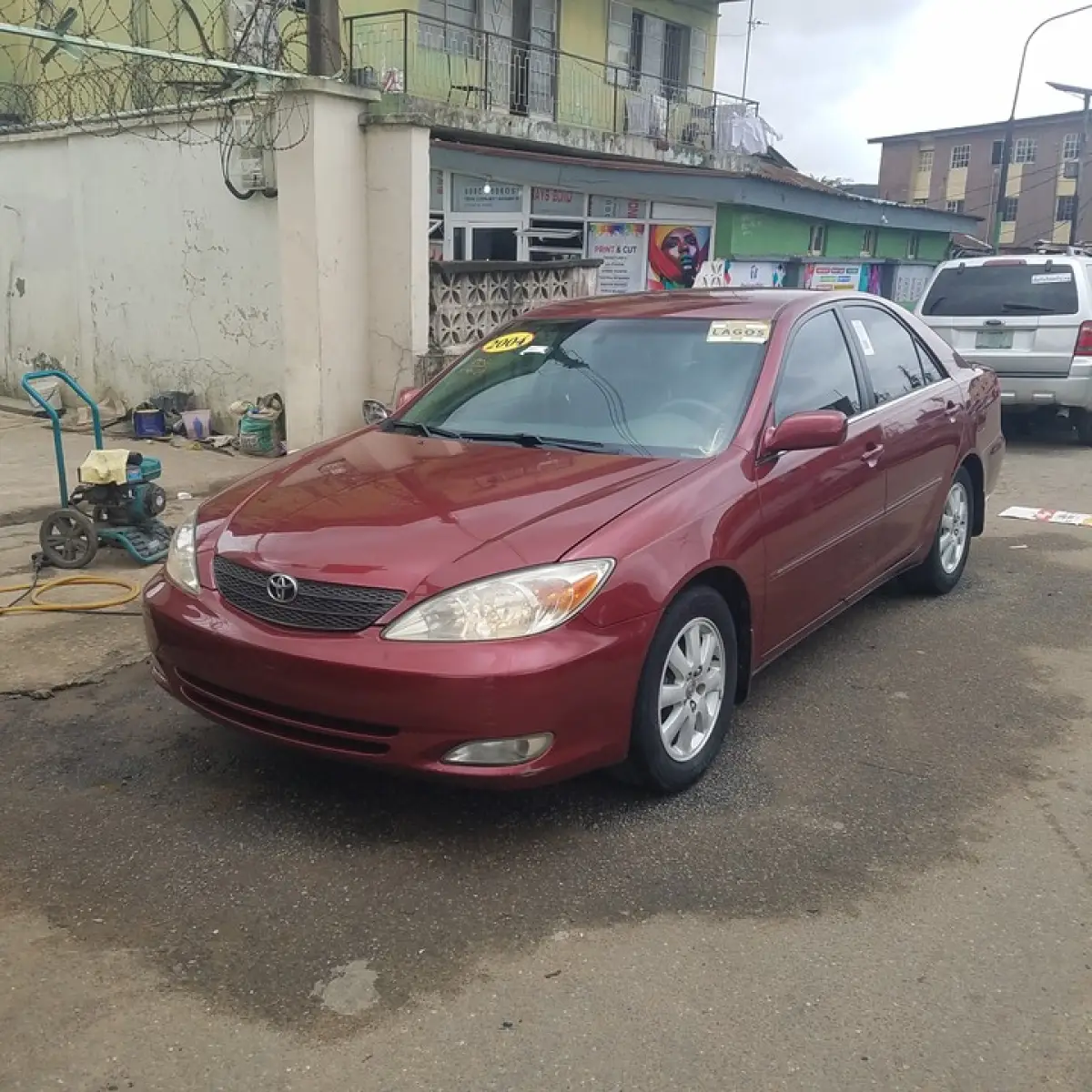 Clean Toyota Camry red color 2004 - Image 1