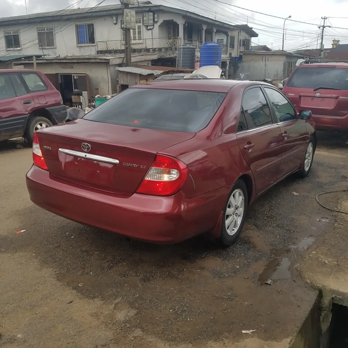 Clean Toyota Camry red color 2004 - Image 3
