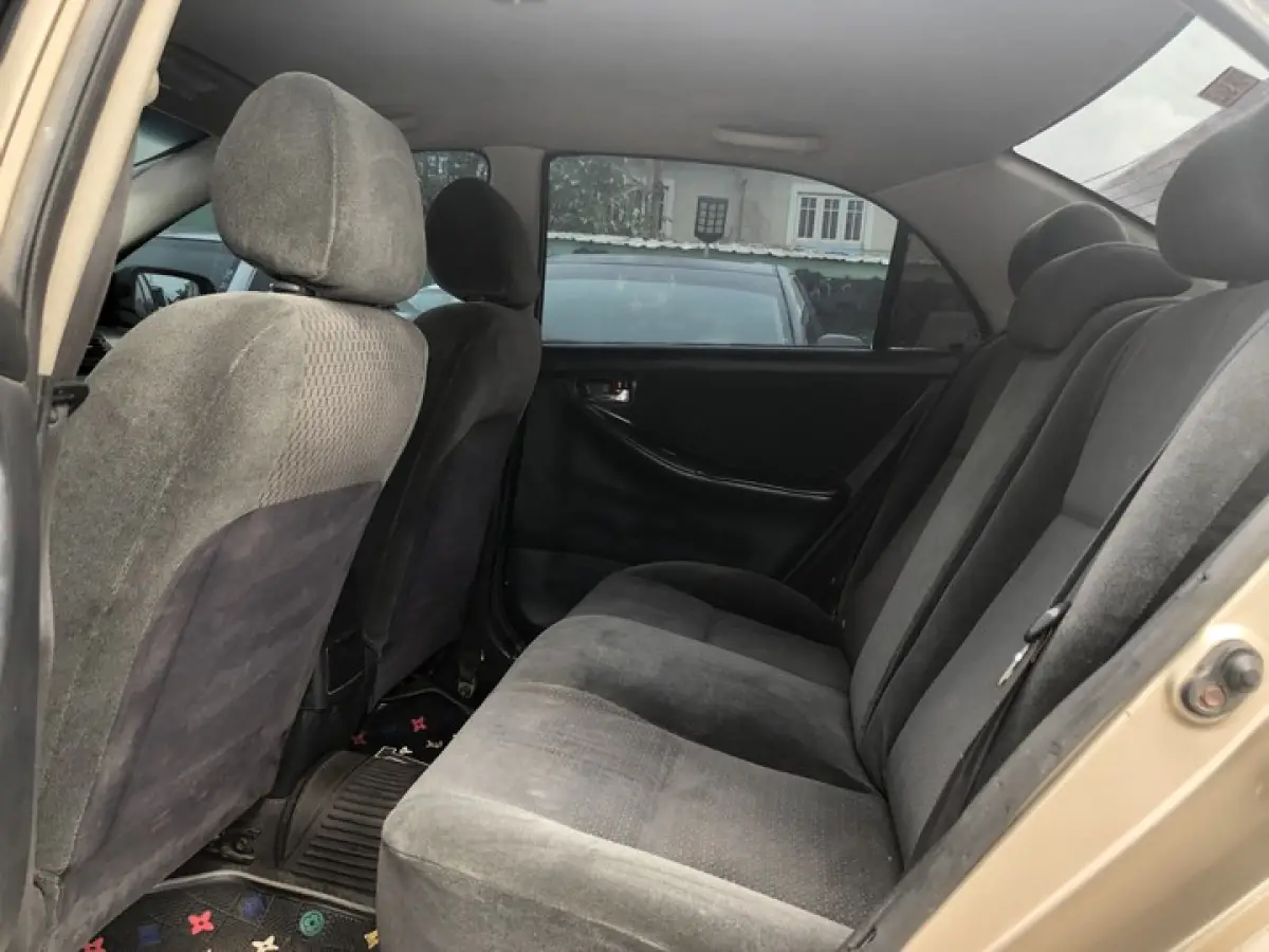 Clean Toyota Corolla 2004 gold for sale - Image 6