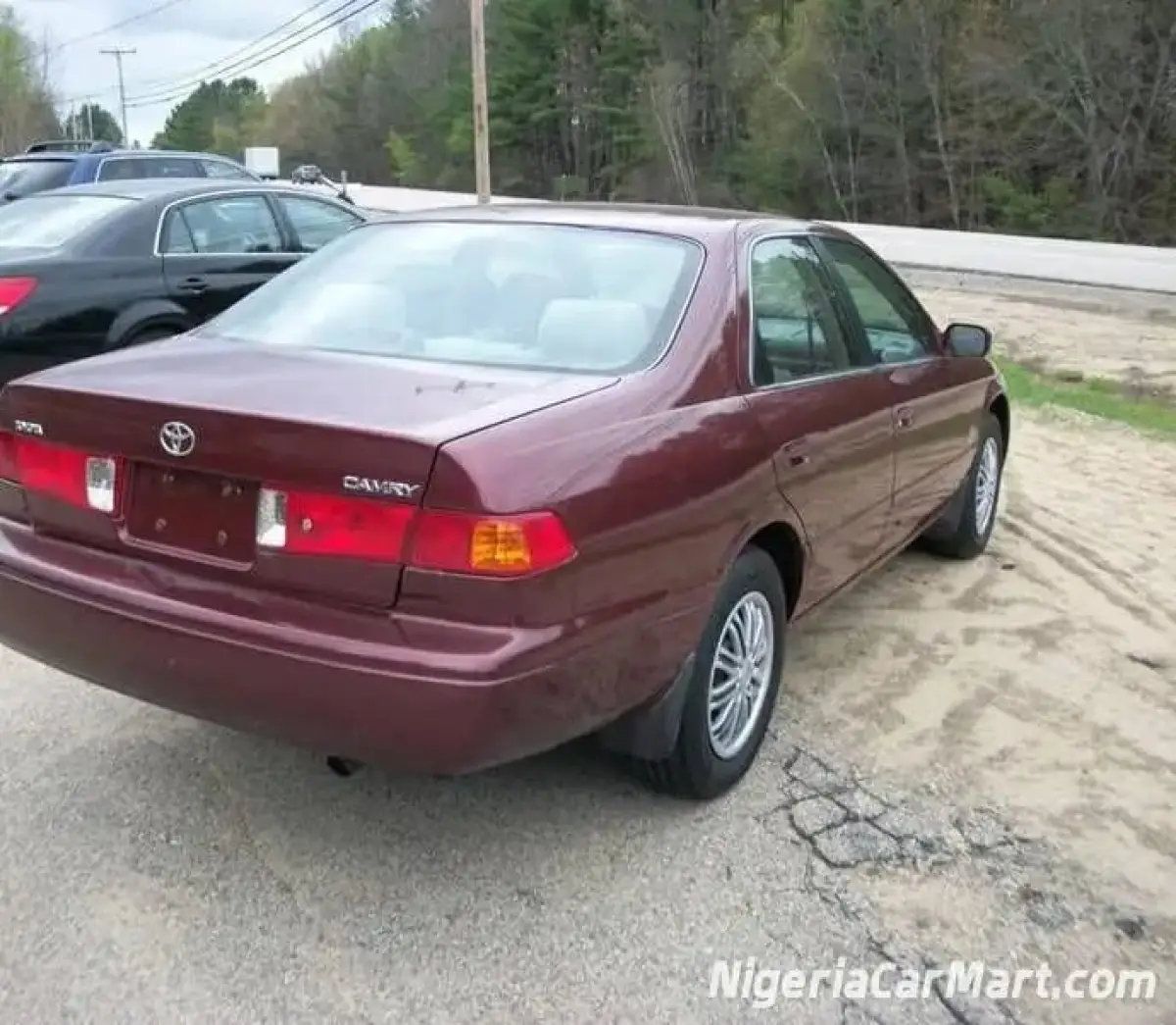 Clean Toyota Camry red color 1999 - Image 3