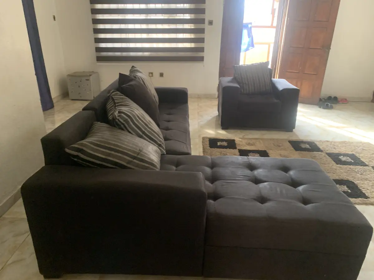 L-Shaped 7seater sofa with throw pillows - Image 1