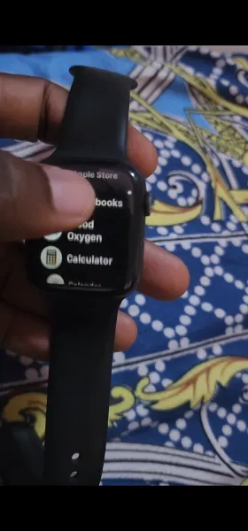 iwatch series 6 with strap and charger and an extra strap