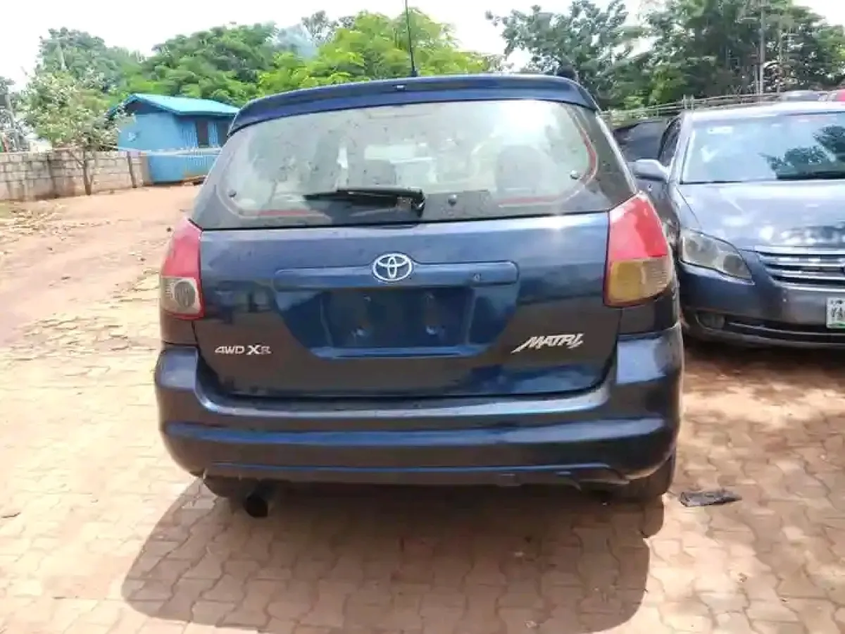 Navy blue Toyota Matrix - Image 1