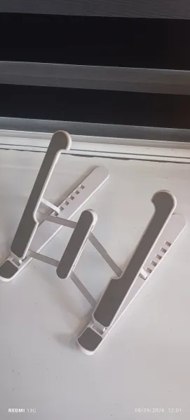 Foldable white plastic laptop stand