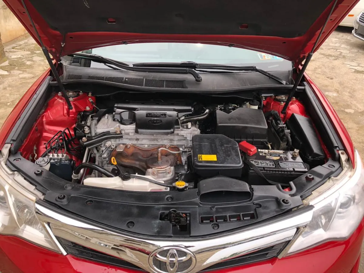 Clean 2012 Toyota Camry red - Image 3