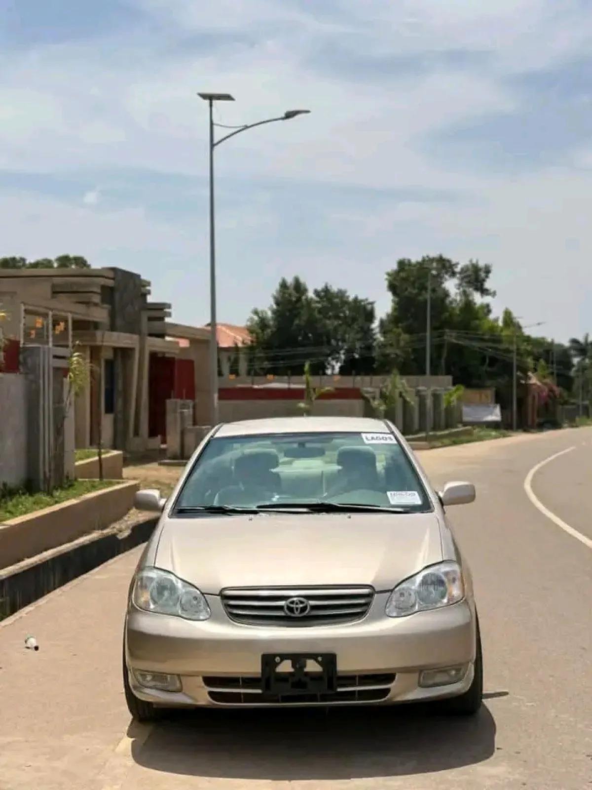 Golden 04 Toyota Corolla - Image 1