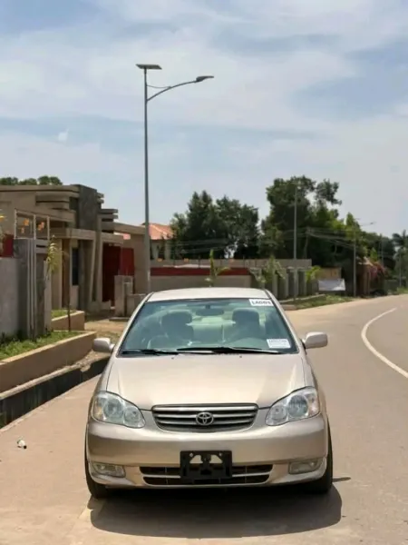 Golden 04 Toyota Corolla