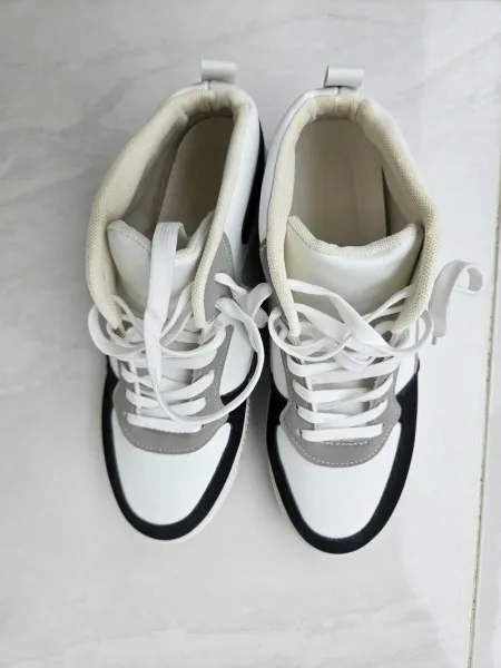 White and black high top sneakers